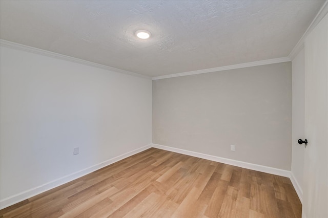 141 Whaley St, Warrenville, SC 29851 - empty room featuring light wood finished floors and ornamental molding