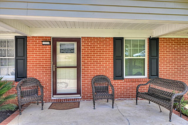 141 Whaley St, Warrenville, SC 29851 - entrance to property featuring a porch and brick siding
