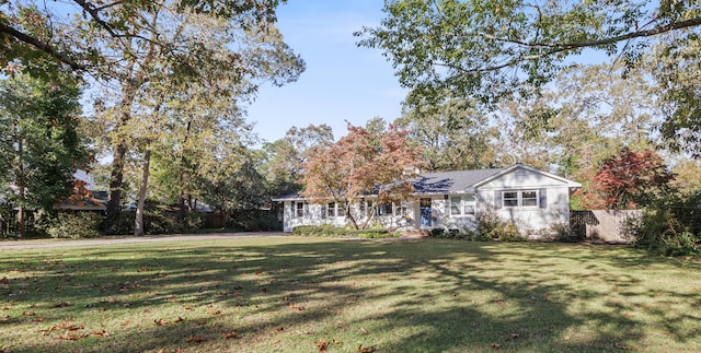 view of front of home with a front yard