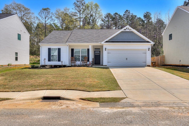 view of front facade featuring a garage and a front lawn