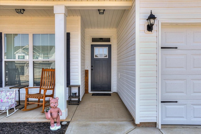 doorway to property with a porch