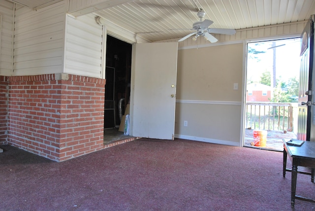 exterior space featuring ceiling fan