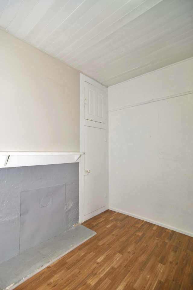 unfurnished living room with hardwood / wood-style flooring