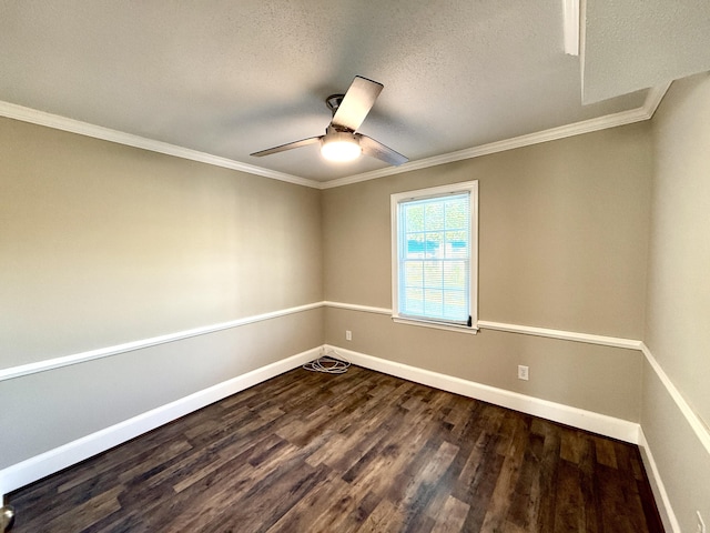empty room with a textured ceiling, baseboards, ornamental molding, ceiling fan, and wood finished floors