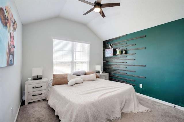 carpeted bedroom featuring baseboards, a ceiling fan, and lofted ceiling