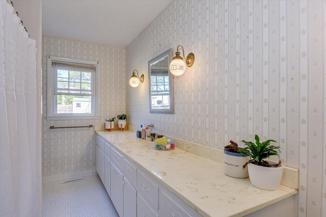 bathroom featuring tile patterned floors and vanity