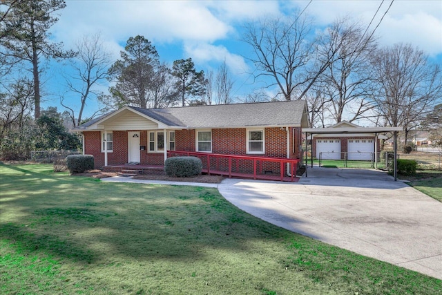 ranch-style house featuring an outbuilding, fence, a front lawn, a porch, and brick siding