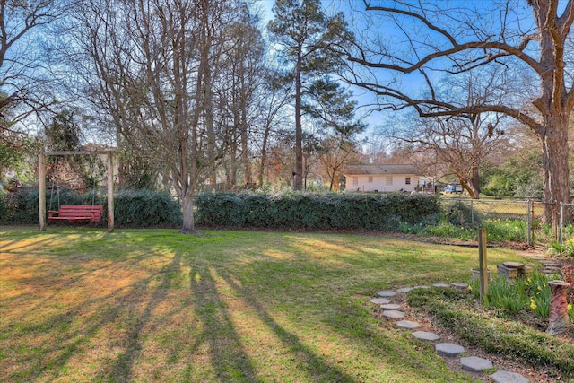 view of yard with fence