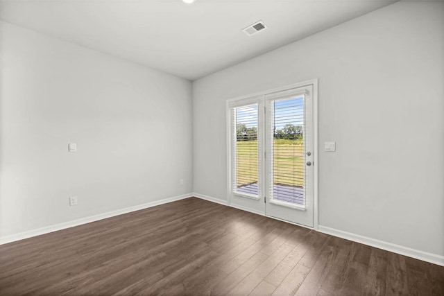 1255 Birch Cir, Grovetown, GA 30813 - spare room with baseboards and dark wood-style flooring