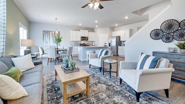 1255 Birch Cir, Grovetown, GA 30813 - living room featuring a ceiling fan, wood finished floors, a chandelier, and recessed lighting