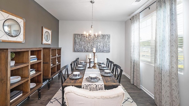 1255 Birch Cir, Grovetown, GA 30813 - dining space featuring a chandelier, dark wood finished floors, and baseboards