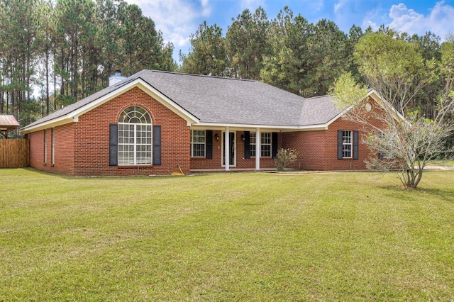 ranch-style house featuring a front lawn