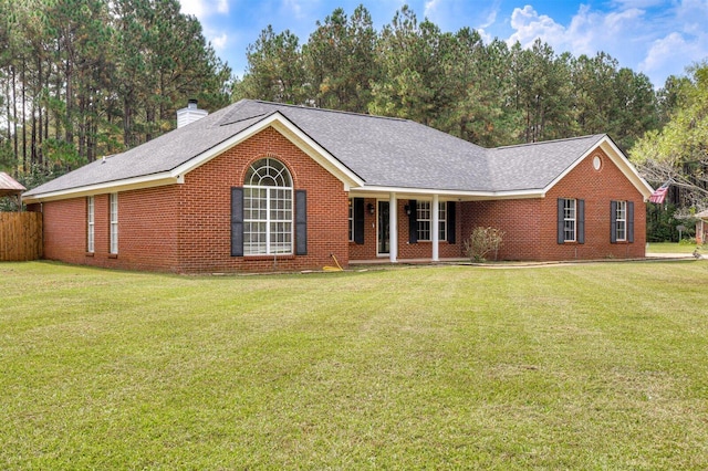 ranch-style home featuring a front lawn and a porch