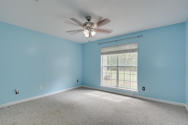 carpeted empty room with ceiling fan