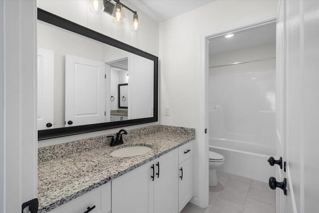 full bathroom featuring tile patterned floors, shower / washtub combination, vanity, and toilet