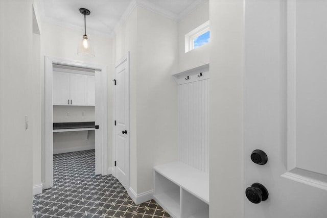 mudroom featuring crown molding