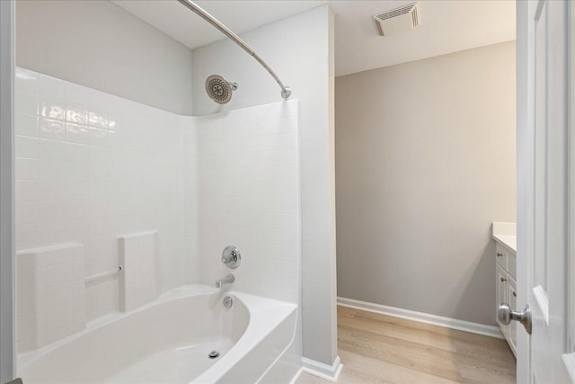 612 Creek Bottom Trl, Grovetown, GA 30813 - bathroom featuring vanity, wood finished floors, and shower / tub combination