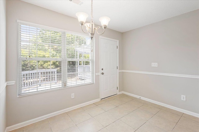 612 Creek Bottom Trl, Grovetown, GA 30813 - unfurnished dining area featuring a chandelier, healthy amount of natural light, and light tile patterned floors