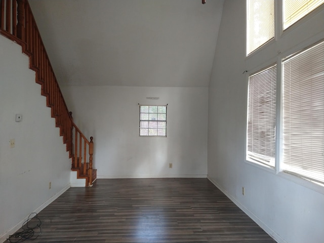 unfurnished room featuring dark hardwood / wood-style flooring