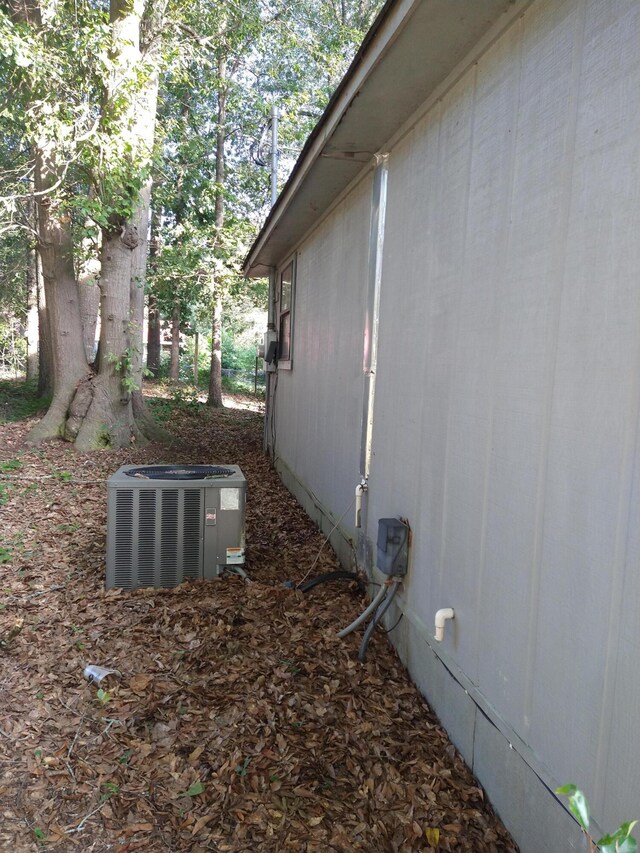 view of property exterior with cooling unit