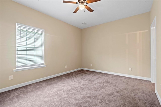 241 Walker St, Augusta, GA 30901 - carpeted empty room with healthy amount of natural light, ceiling fan, and baseboards