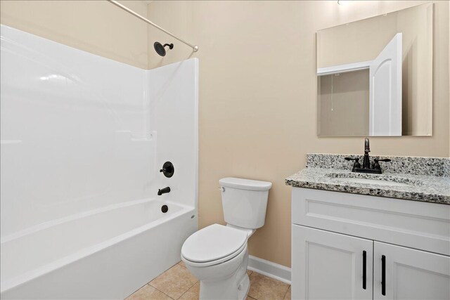241 Walker St, Augusta, GA 30901 - bathroom with toilet, vanity, bathtub / shower combination, tile patterned floors, and baseboards