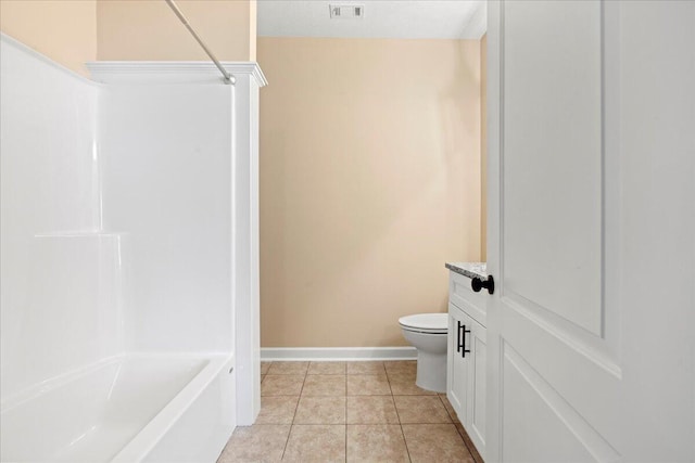 241 Walker St, Augusta, GA 30901 - bathroom with toilet, baseboards, tile patterned floors, and bathing tub / shower combination