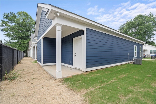 241 Walker St, Augusta, GA 30901 - view of home's exterior with central AC unit and a patio