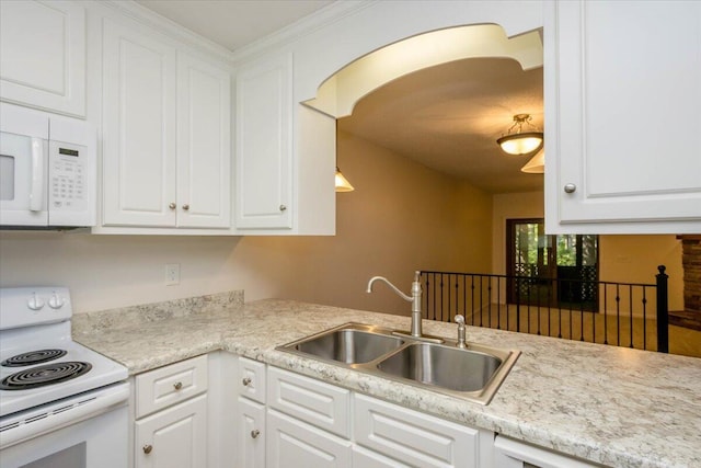 327 Joshua Tree Dr, Martinez, GA 30907 - kitchen featuring white appliances, a sink, white cabinetry, and light countertops