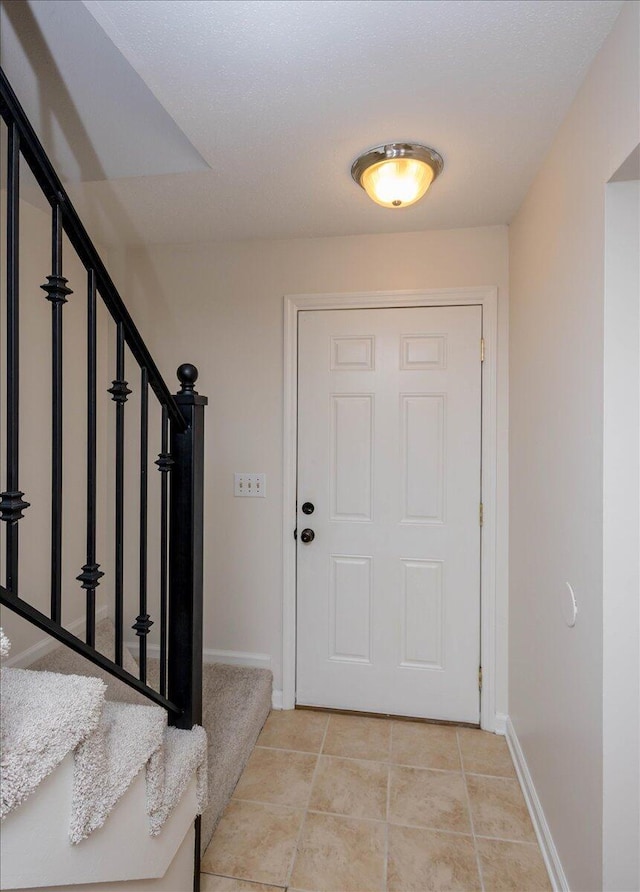 327 Joshua Tree Dr, Martinez, GA 30907 - foyer entrance with stairway, baseboards, and light tile patterned flooring
