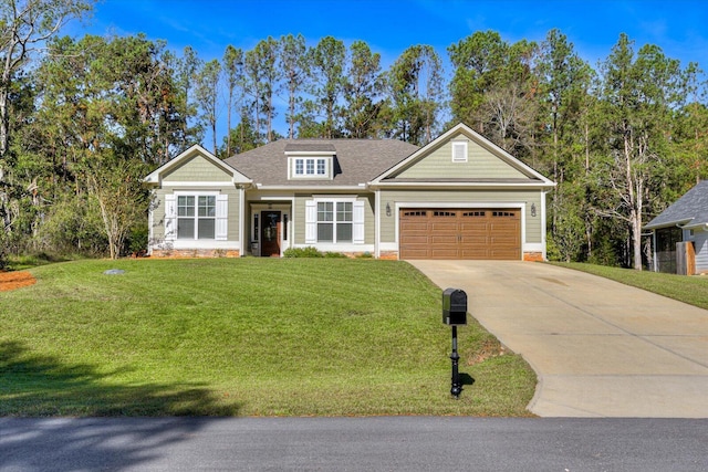 craftsman-style house with a garage and a front lawn