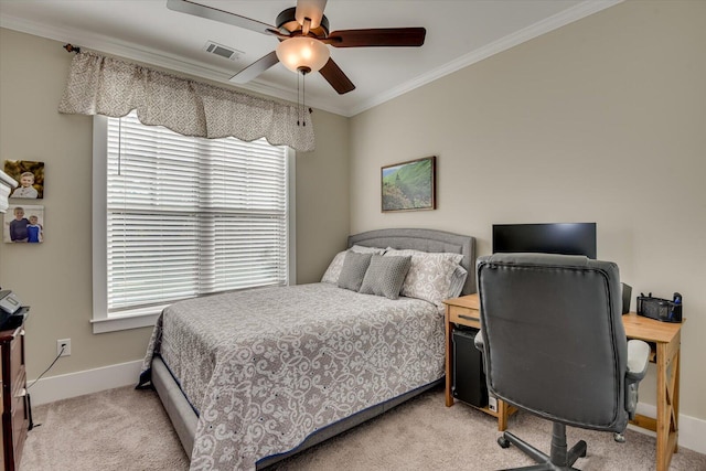 bedroom featuring ceiling fan, ornamental molding, light carpet, and multiple windows