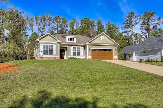 view of front of property featuring central AC, a front yard, and a garage