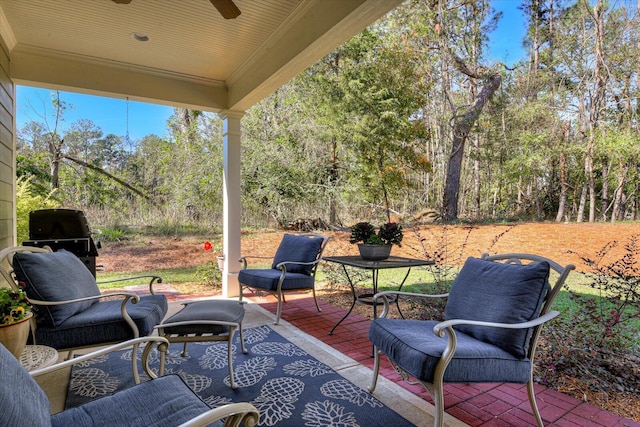 view of patio / terrace featuring ceiling fan