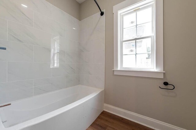 550 Bogey Ct, Graniteville, SC 29829 - bathroom with baseboards, wood finished floors, and bathtub / shower combination