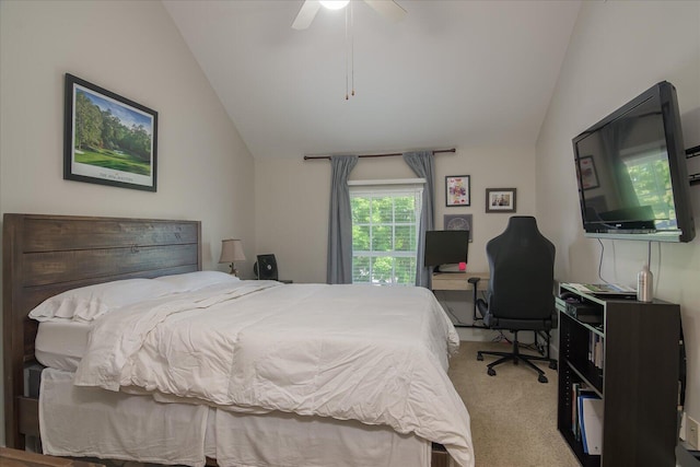 bedroom with light carpet, vaulted ceiling, and ceiling fan