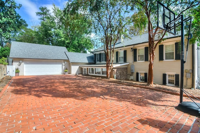 view of front of property featuring a garage