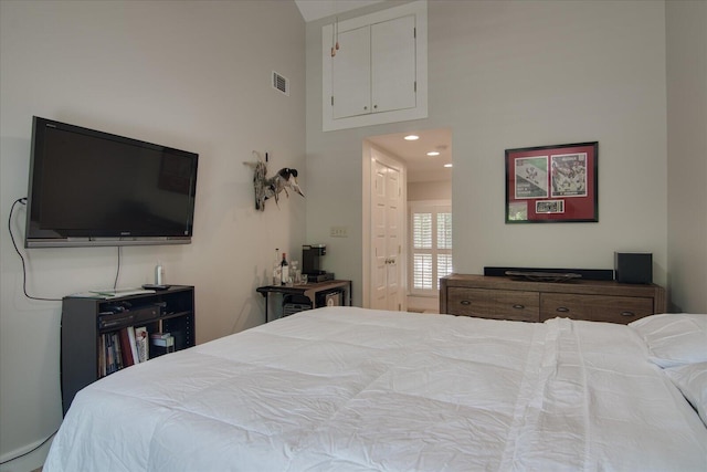 bedroom featuring lofted ceiling