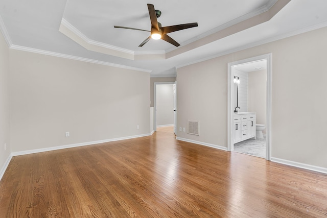4200 Waters Edge Ln, Appling, GA 30802 - unfurnished room with a ceiling fan, a raised ceiling, wood finished floors, and crown molding