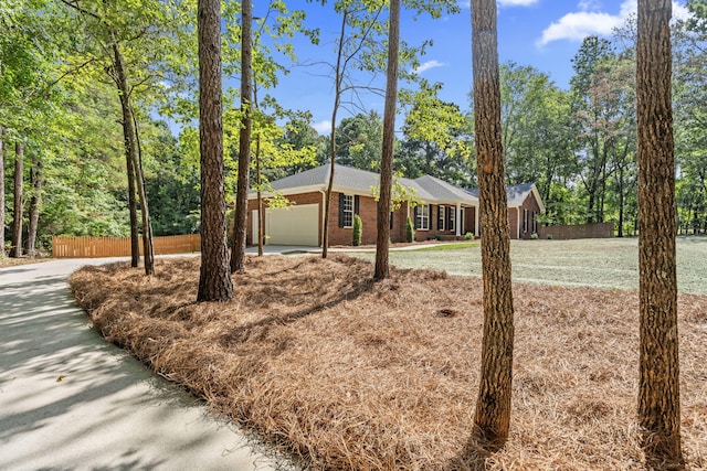 4200 Waters Edge Ln, Appling, GA 30802 - ranch-style house with a garage, brick siding, and driveway