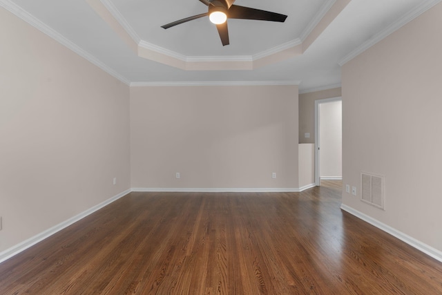 4200 Waters Edge Ln, Appling, GA 30802 - spare room with a ceiling fan, dark wood finished floors, a raised ceiling, and ornamental molding