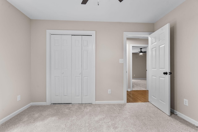 4200 Waters Edge Ln, Appling, GA 30802 - unfurnished bedroom with carpet flooring, a closet, and a ceiling fan