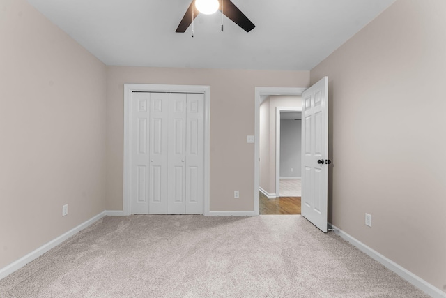 4200 Waters Edge Ln, Appling, GA 30802 - unfurnished bedroom featuring carpet floors, a closet, and a ceiling fan