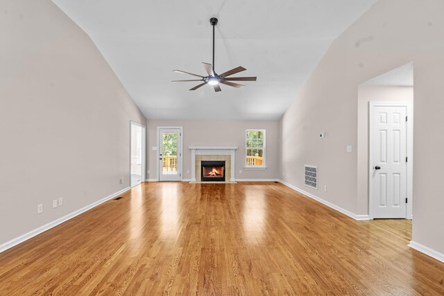 4200 Waters Edge Ln, Appling, GA 30802 - unfurnished living room featuring a ceiling fan, light wood-type flooring, a fireplace, and high vaulted ceiling