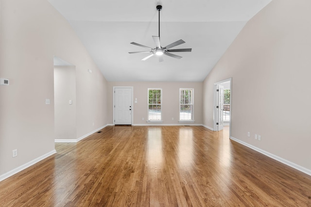 4200 Waters Edge Ln, Appling, GA 30802 - unfurnished living room with ceiling fan, light wood finished floors, and high vaulted ceiling