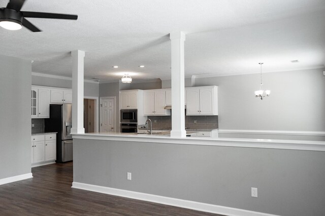 724 Avrett Cir, Evans, GA 30809 - kitchen with stainless steel appliances, crown molding, ceiling fan, tasteful backsplash, and white cabinetry