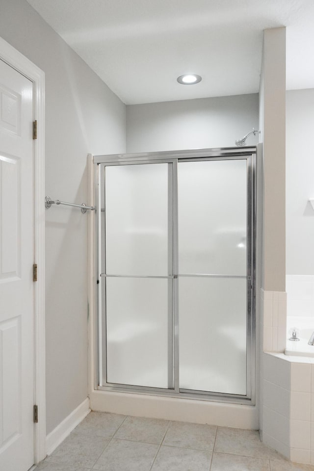 724 Avrett Cir, Evans, GA 30809 - bathroom with a stall shower, a garden tub, tile patterned flooring, and recessed lighting