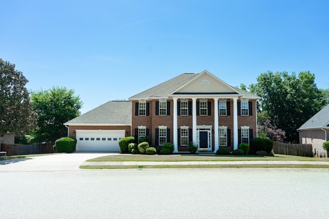 724 Avrett Cir, Evans, GA 30809 - greek revival inspired property with a garage, driveway, and brick siding