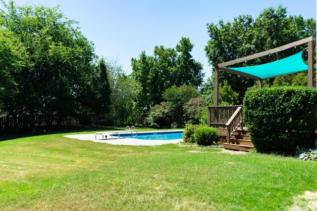 724 Avrett Cir, Evans, GA 30809 - view of yard featuring a deck and view of scattered trees