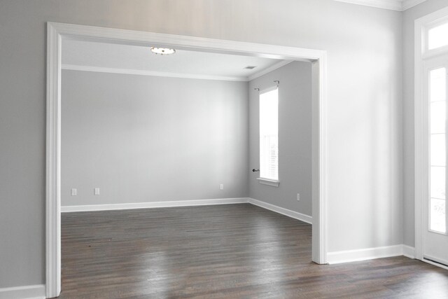 724 Avrett Cir, Evans, GA 30809 - unfurnished room featuring crown molding, dark wood-style flooring, and baseboards
